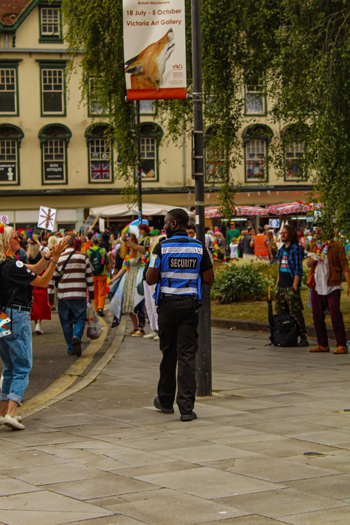 SIA-licensed AV Group UK security officer stewarding a public street event in Bath
